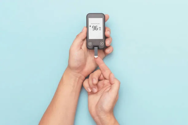 linked check blood sugar level with finger prick
