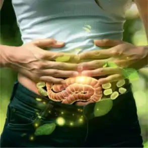 Person holding stomach with glowing digestive system illustration, symbolizing gut health