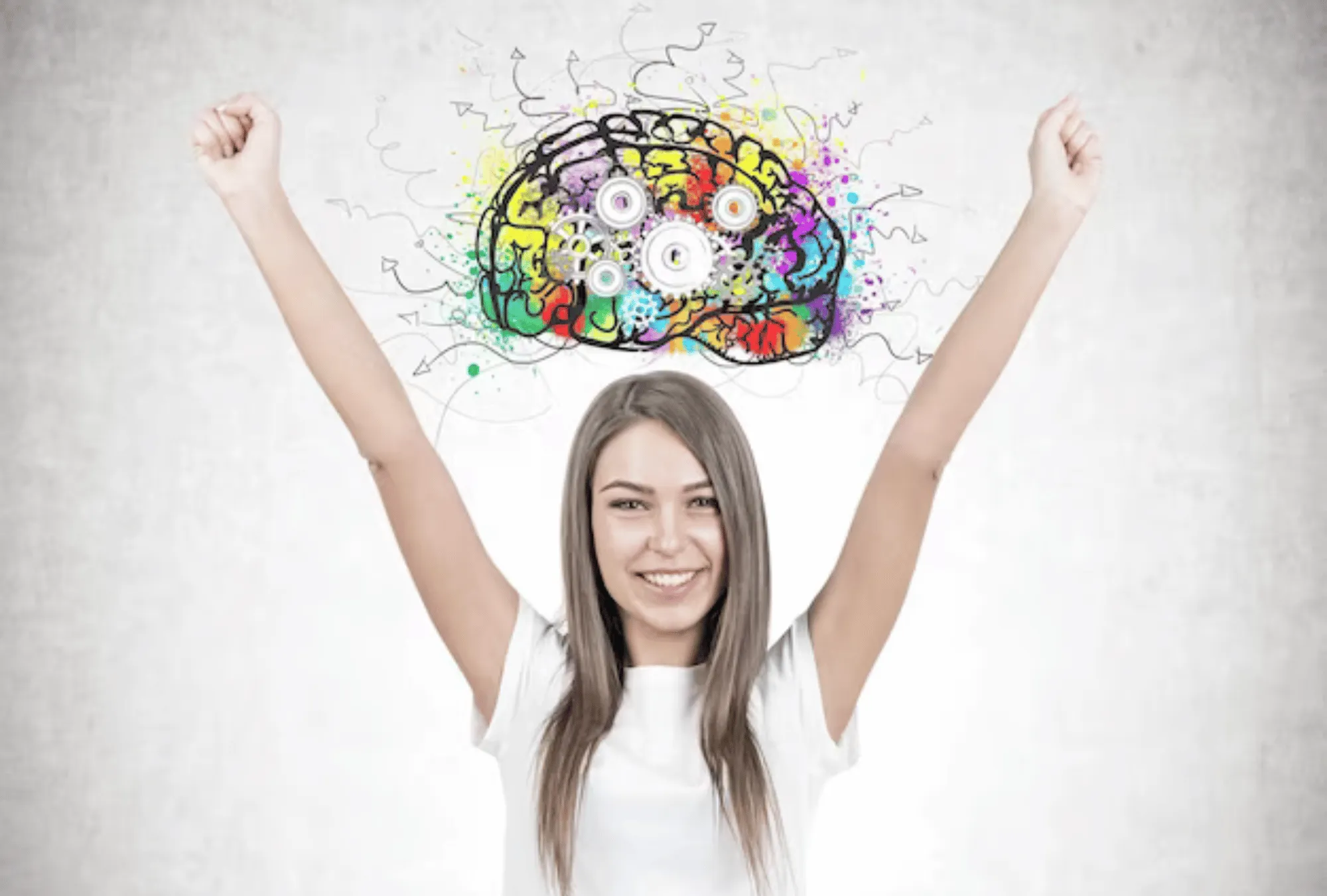 Happy woman raising arms with colorful brain illustration symbolizing dopamine
